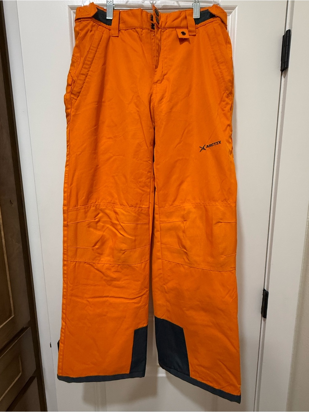 Arctix Boys Bright Orange Snow Pants with Dark Reinforced Hems